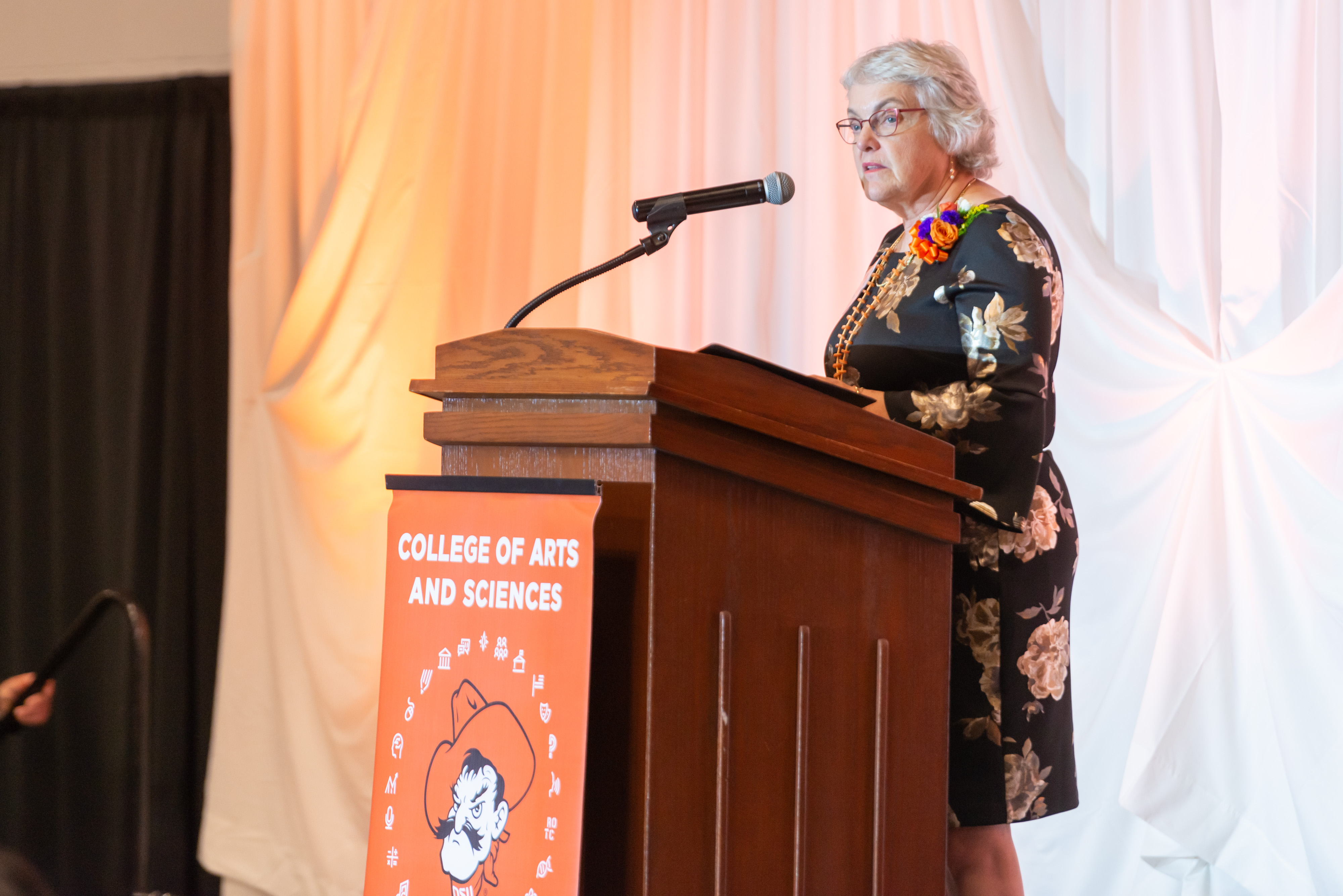 Ardoth Hassler speaking at the CAS Hall of Fame ceremony.